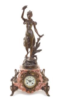 A French Cast Metal and Marble Figural Mantel Clock, Height 27 inches.