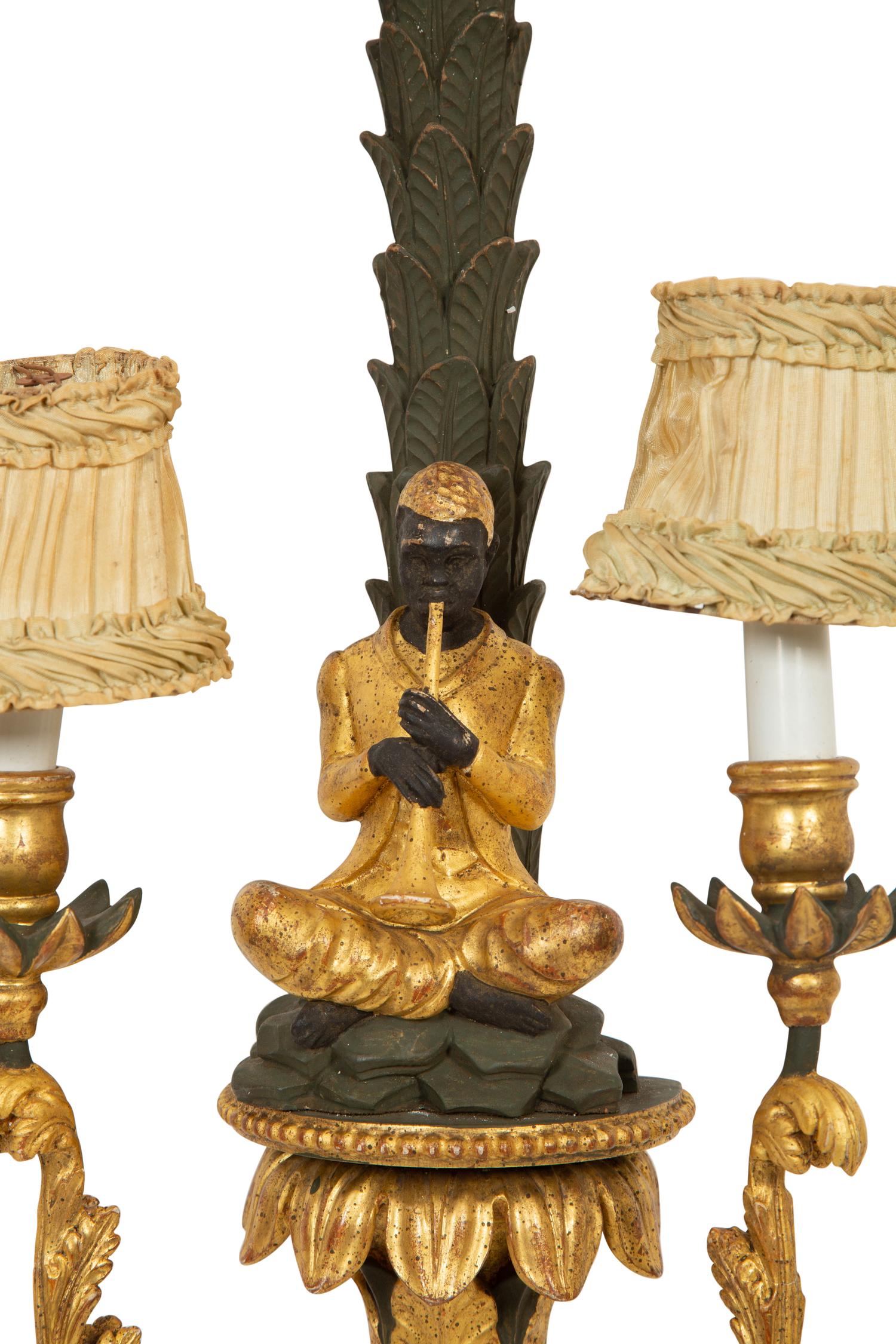 A Pair of Painted and Parcel Gilt Carved Wood Sconces