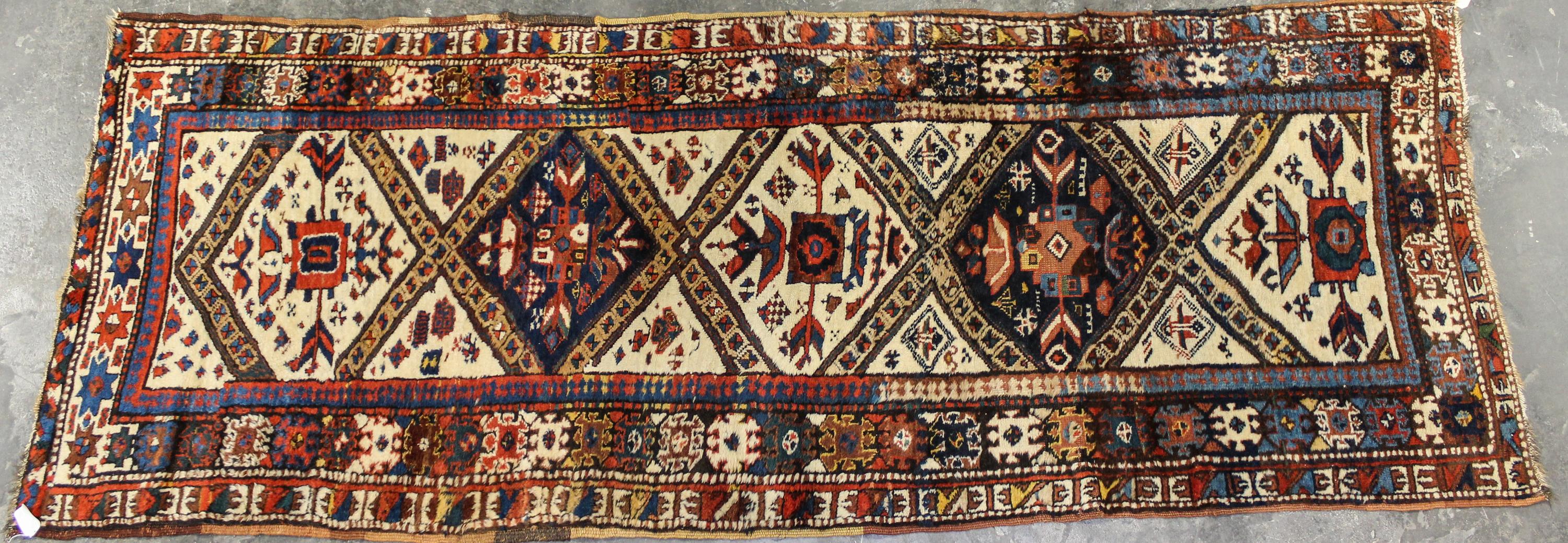 A Northwest Persian Wool Runner 9 feet 8 inches x 3 feet 6 inches. — MID 20TH CENTURY