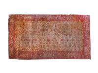 A Turkish Wool Rug — 20TH CENTURY