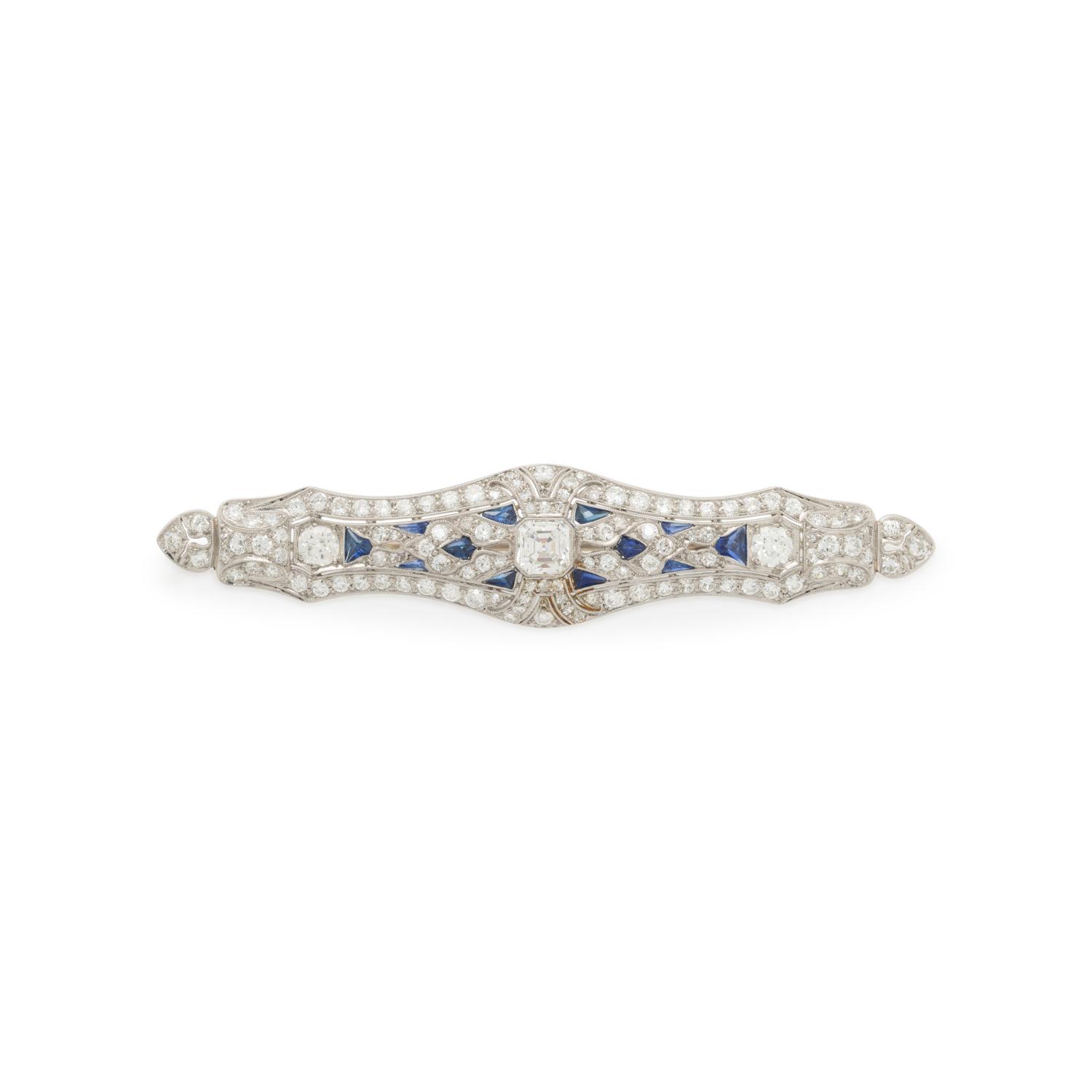 PLATINUM, DIAMOND, AND SYNTHETIC SAPPHIRE BROOCH