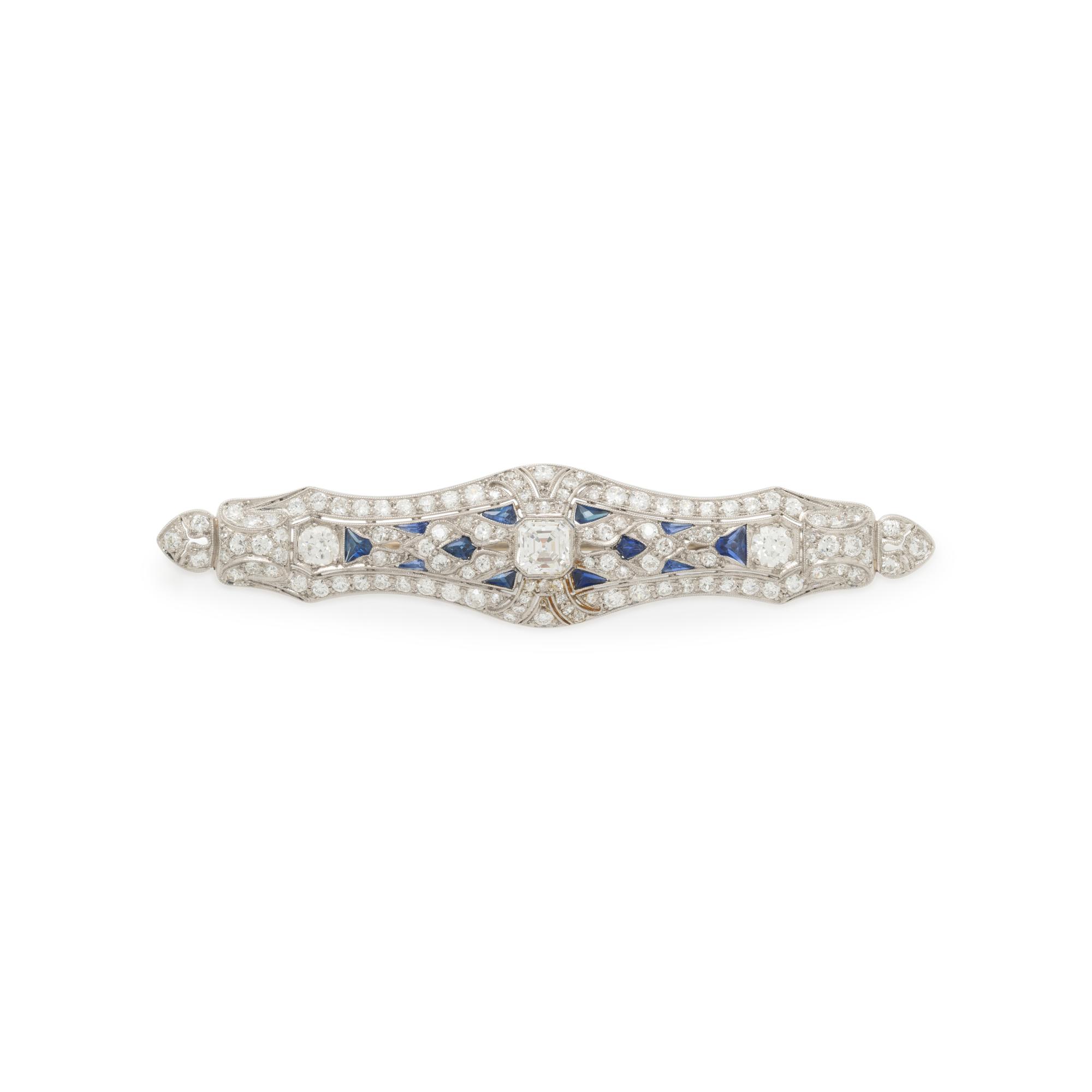 PLATINUM, DIAMOND, AND SYNTHETIC SAPPHIRE BROOCH