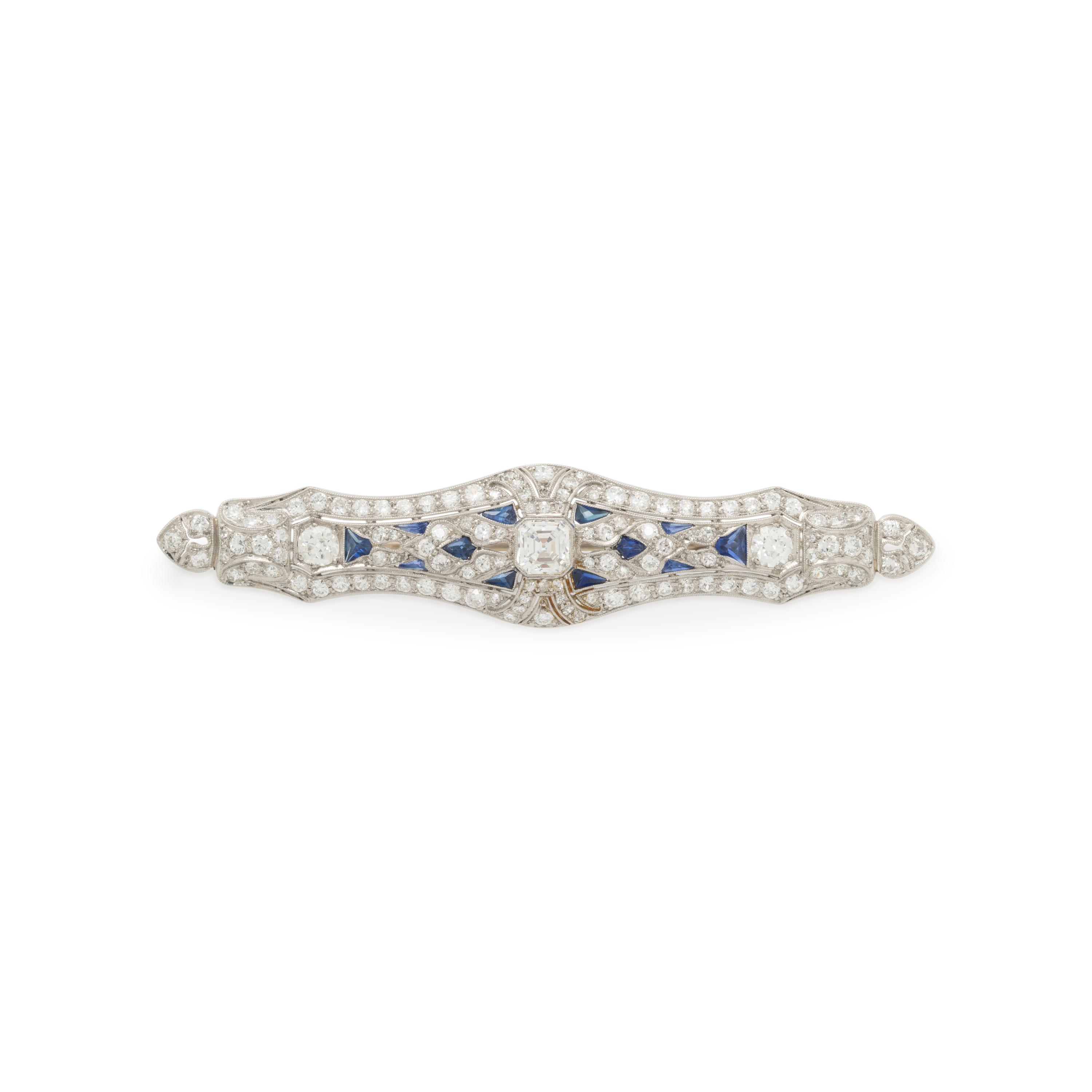 PLATINUM, DIAMOND, AND SYNTHETIC SAPPHIRE BROOCH