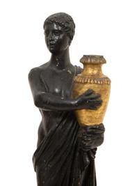 A Pair of Continental Carved, Parcel Ebonized and Gilt Wood Neoclassical Figures