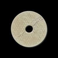 A Chinese greyish white jade archaistic bi disk 灰白玉璧