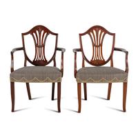 A Pair of George III Mahogany Armchairs