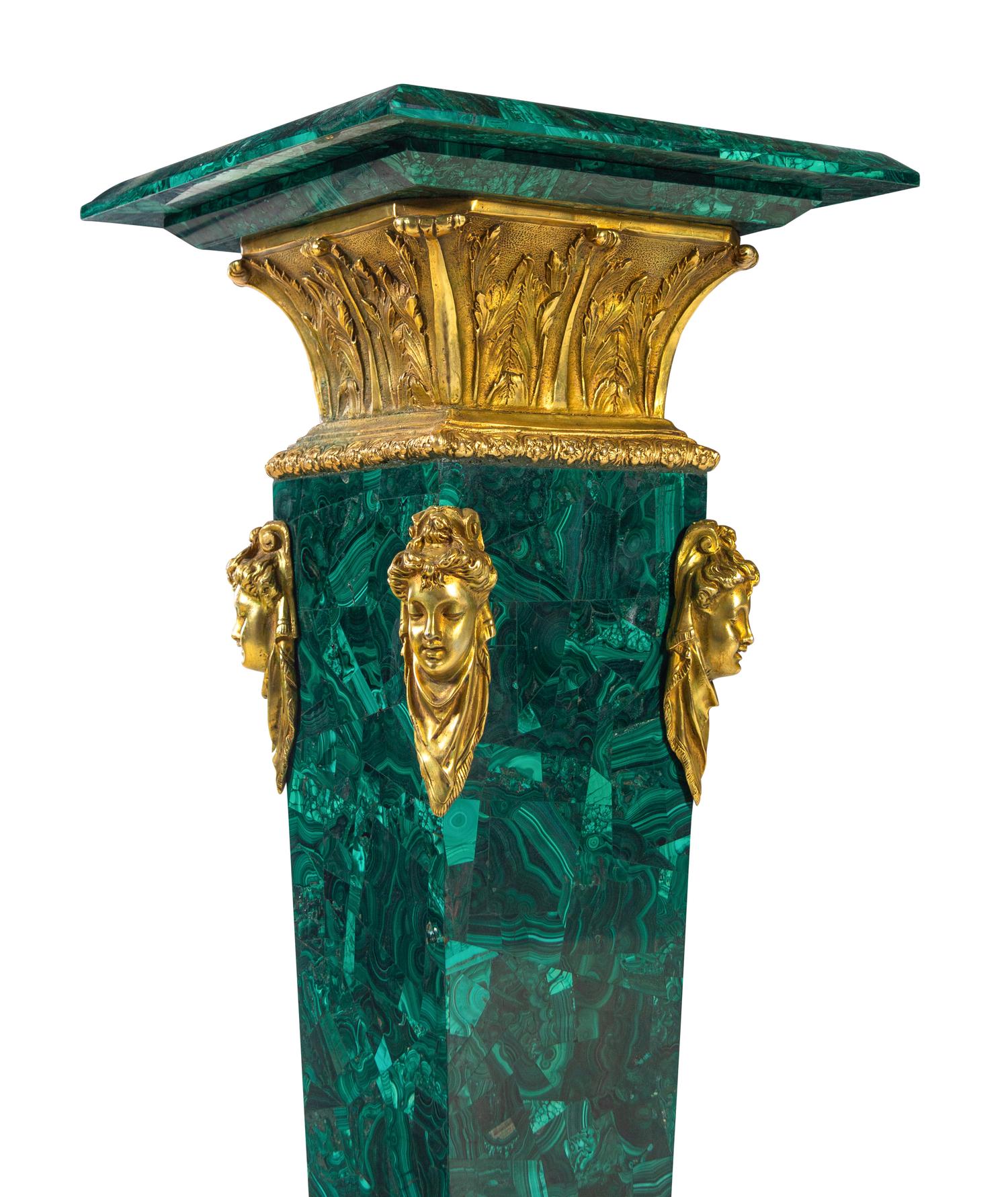 A Pair of Louis XVI Style Gilt Bronze Mounted Malachite Pedestals