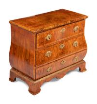 A German Gilt Bronze Mounted and Parcel Gilt Burl Walnut Bombe Chest in the Louis XV Taste