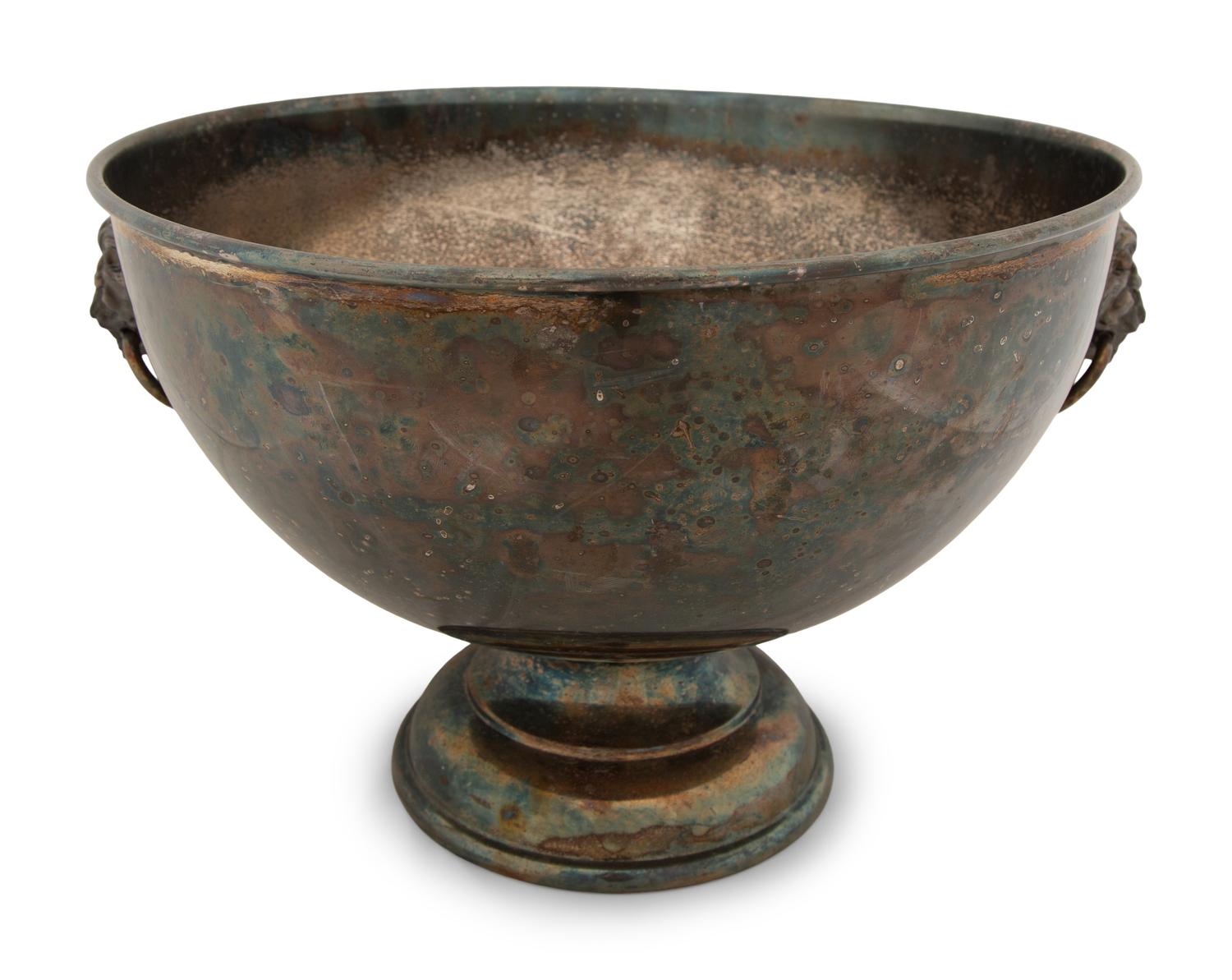 An Assembled Trio of Silverplate Footed Punch Bowls with Lionhead Handles