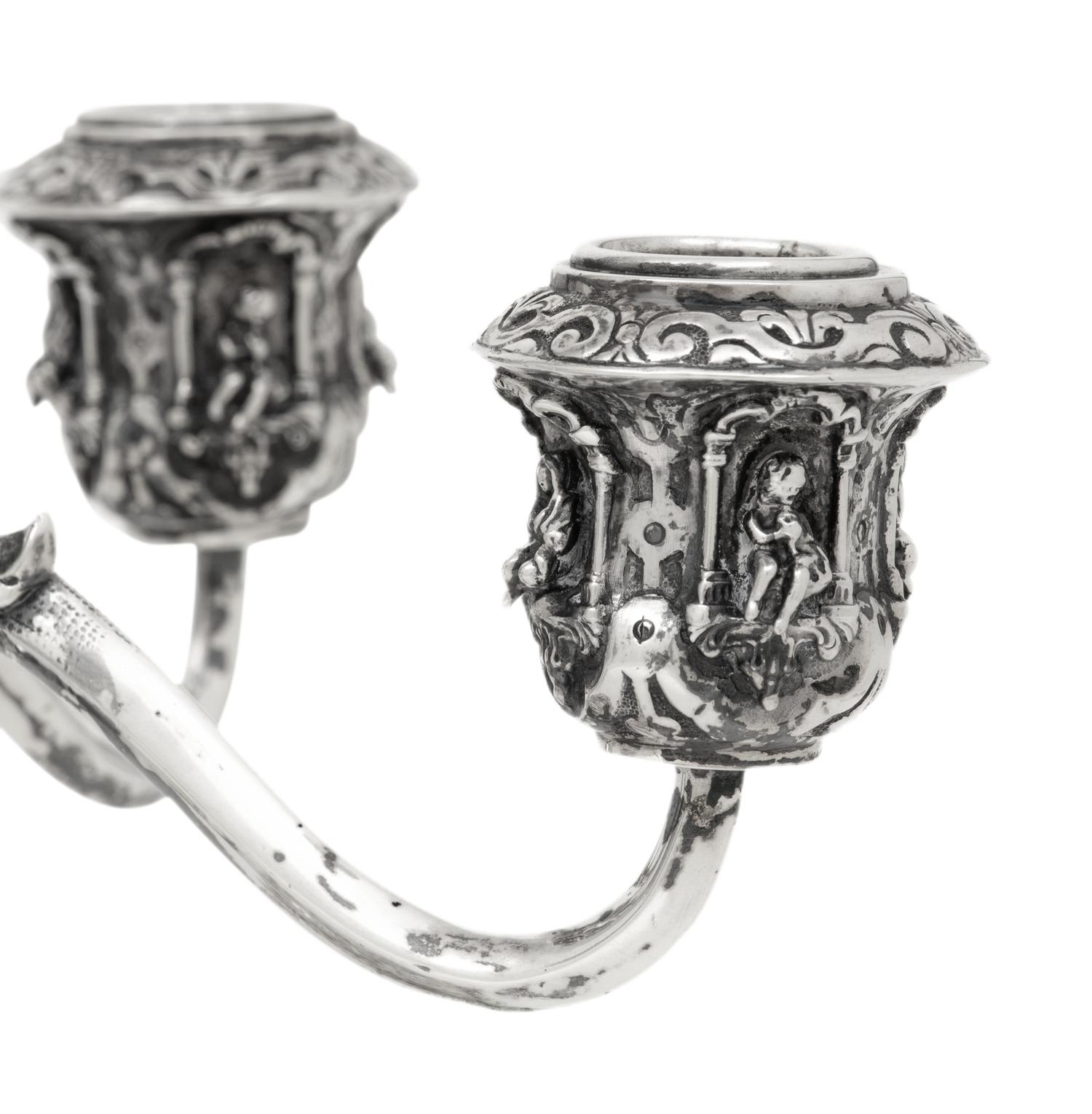 A Pair of German Silver Five-Light Candelabra