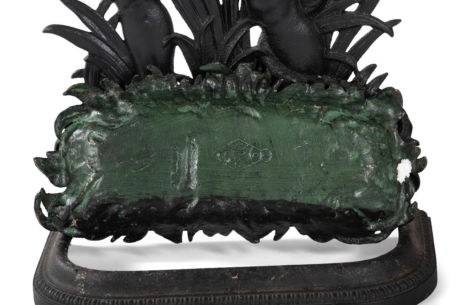 A Cast Iron Putto and Serpent Umbrella Stand