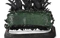 A Cast Iron Putto and Serpent Umbrella Stand