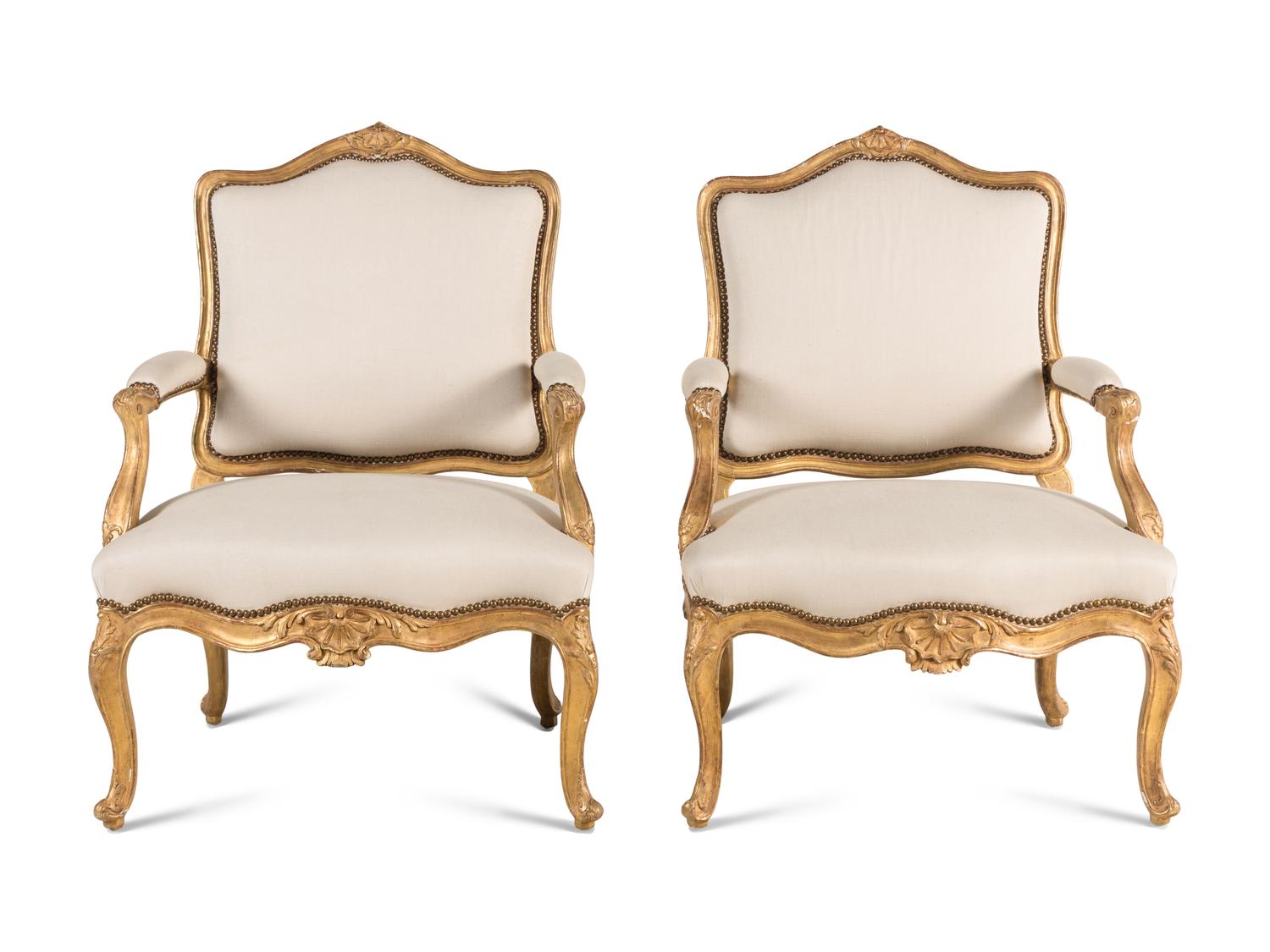 A Pair of Italian Rococo Shell-Carved Giltwood Fauteuils