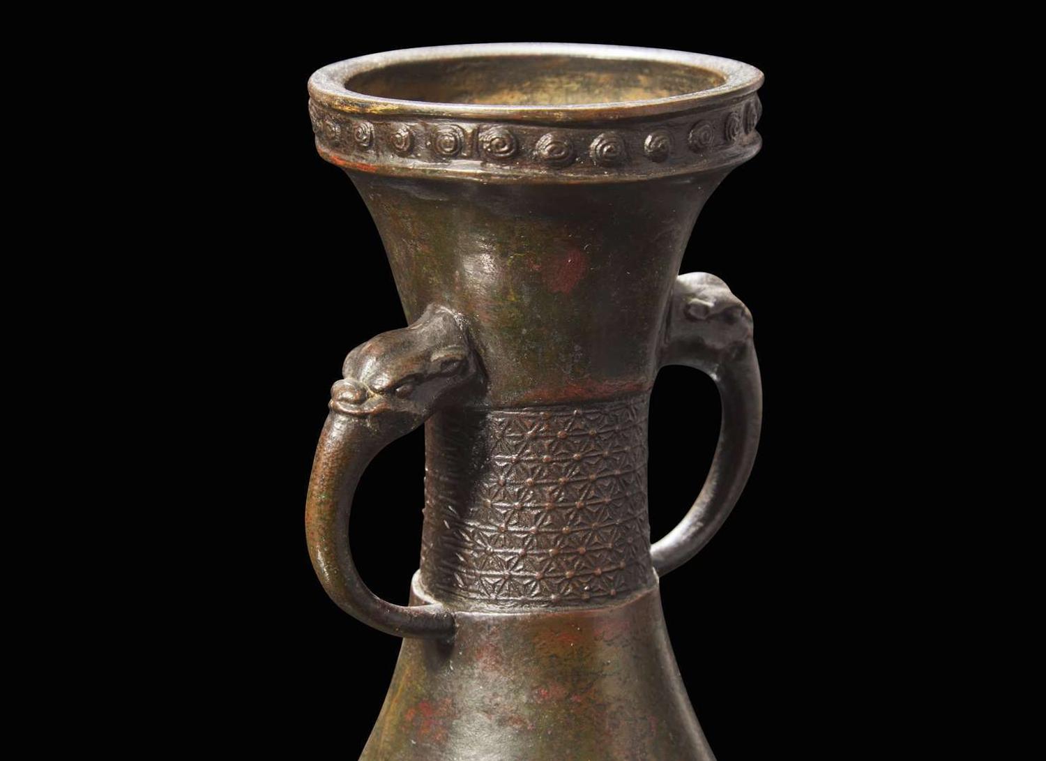 A Chinese patinated bronze vase, probably Yuan dynasty 銅加漆獸耳瓶 或元