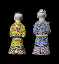 Two Chinese Export Famille Rose Porcelain Figures of Boys