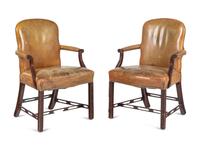A Pair of George III Style Leather-Upholstered Mahogany Armchairs