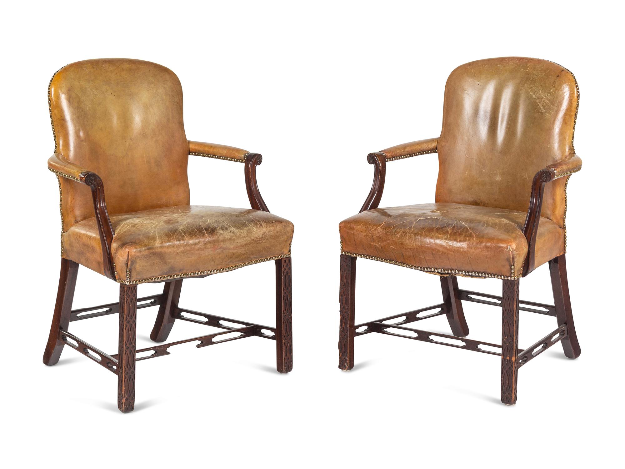 A Pair of George III Style Leather-Upholstered Mahogany Armchairs