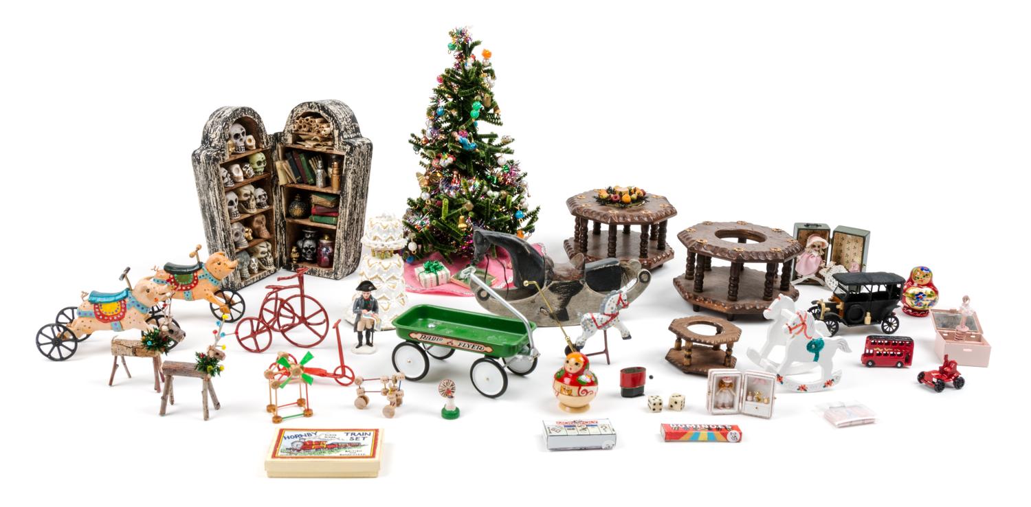 A Christmas Tree and a Collection of Toys Height of Christmas tree 7 inches.