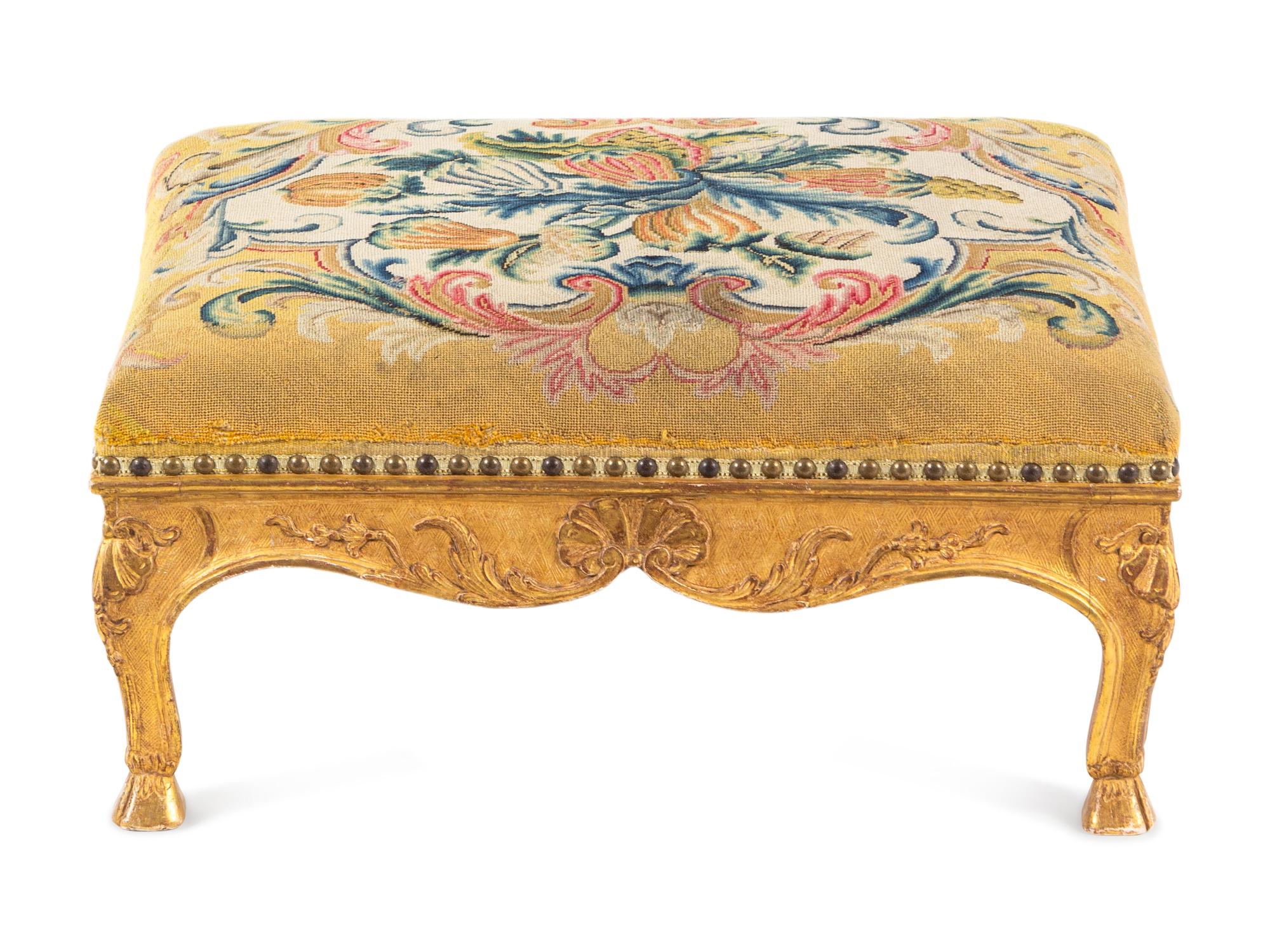 A Régence Needlepoint-Upholstered Giltwood Stool