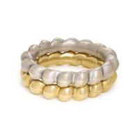 PAIR OF WHITE AND YELLOW GOLD BANGLE BRACELETS