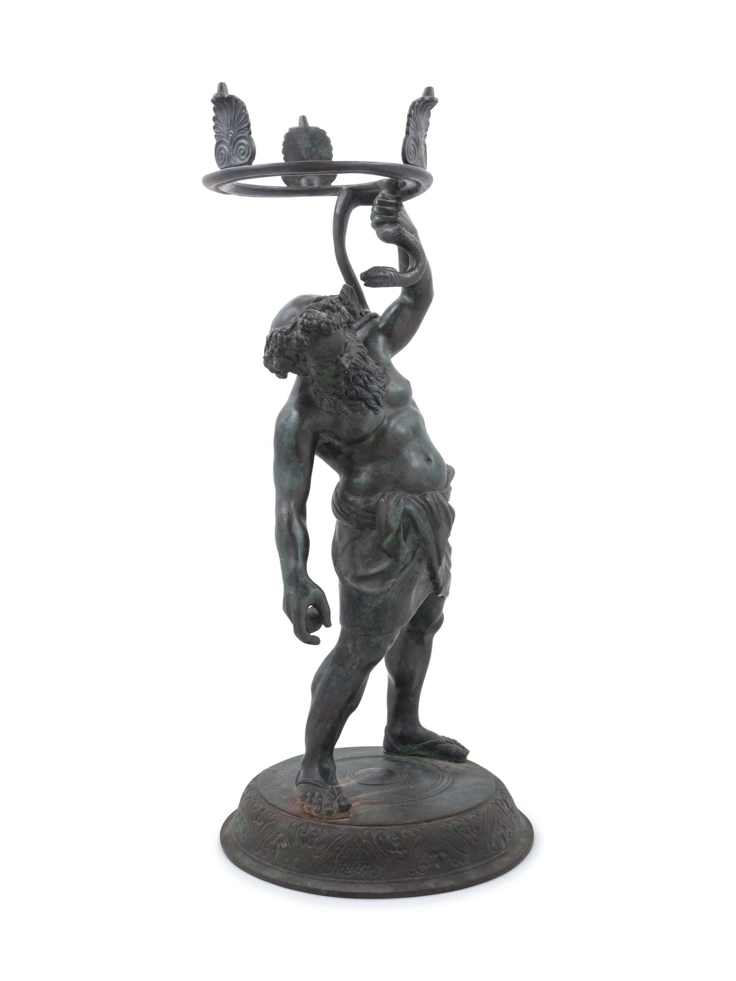 A Grand Tour Patinated Metal Figure of Silenus
