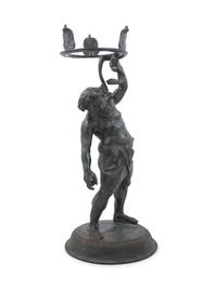 A Grand Tour Patinated Metal Figure of Silenus