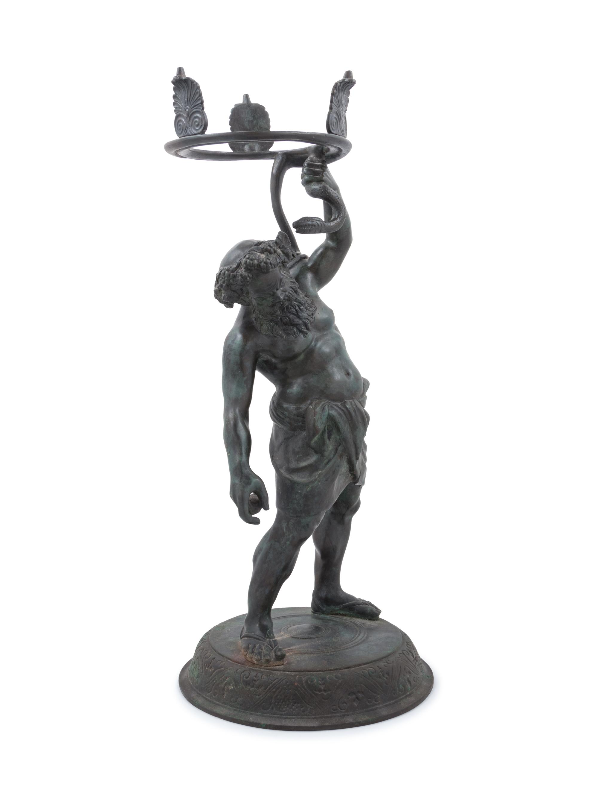 A Grand Tour Patinated Metal Figure of Silenus