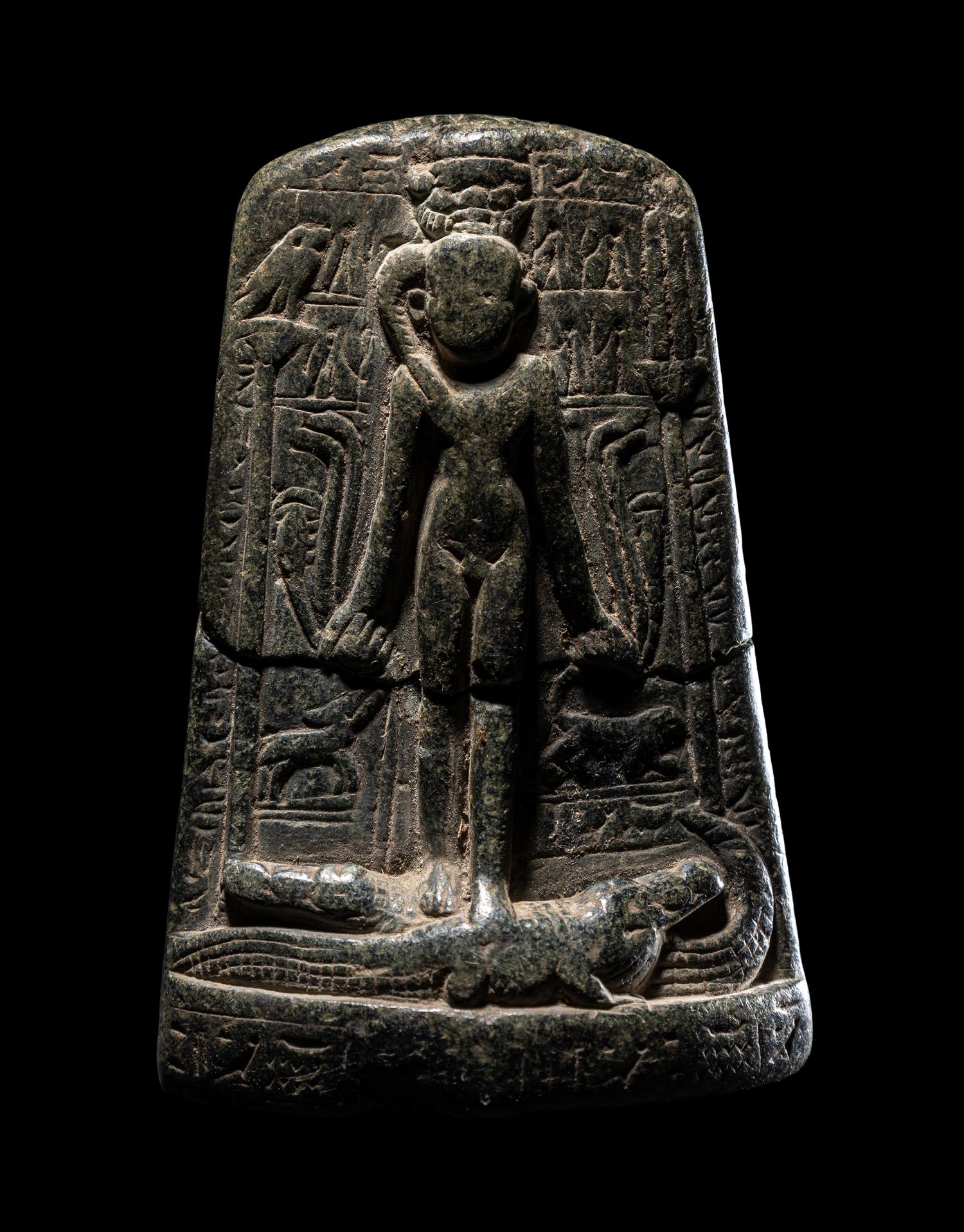 An Egyptian Black Stone Cippus of Horus