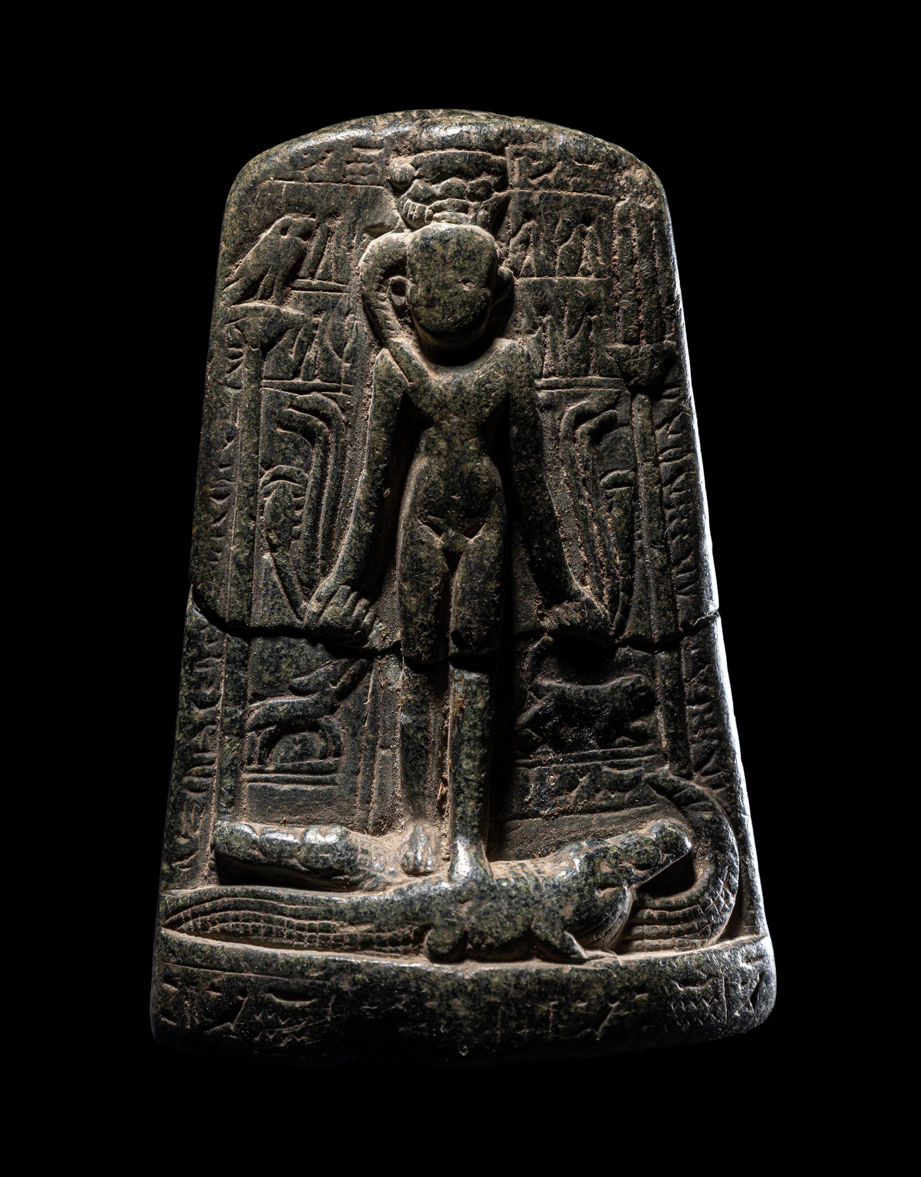 An Egyptian Black Stone Cippus of Horus