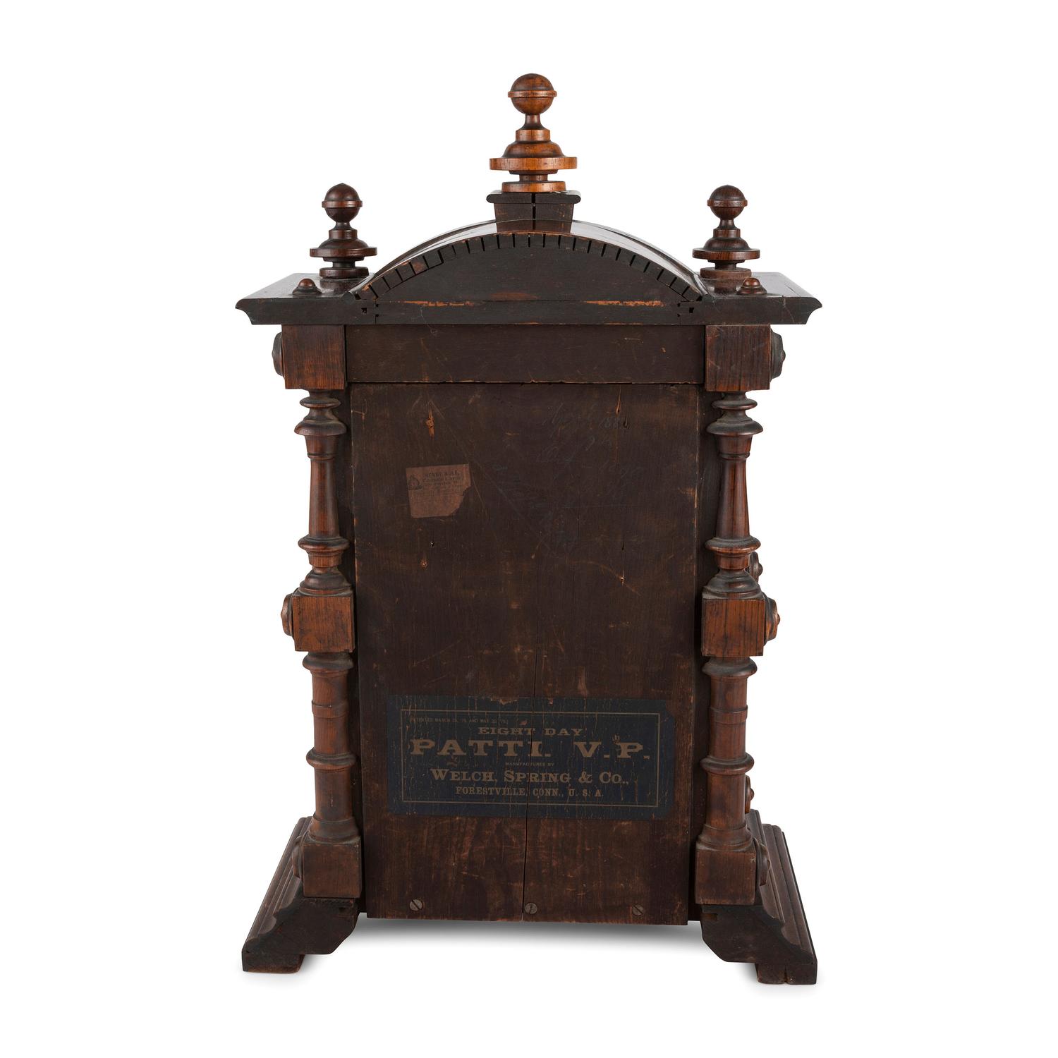 A Carved Rosewood Welch 'Patti VP' Shelf Clock