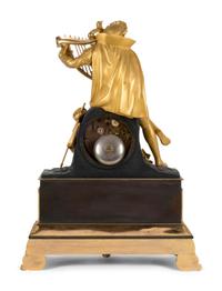 A Charles X Patinated and Gilt Bronze Figural Mantel Clock