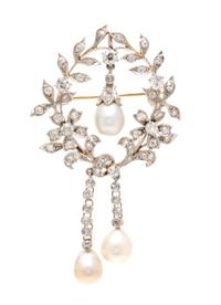 An Edwardian Platinum Topped Yellow Gold, Natural Baroque Pearl and Diamond Pendant/Brooch, 10.90 dwts.