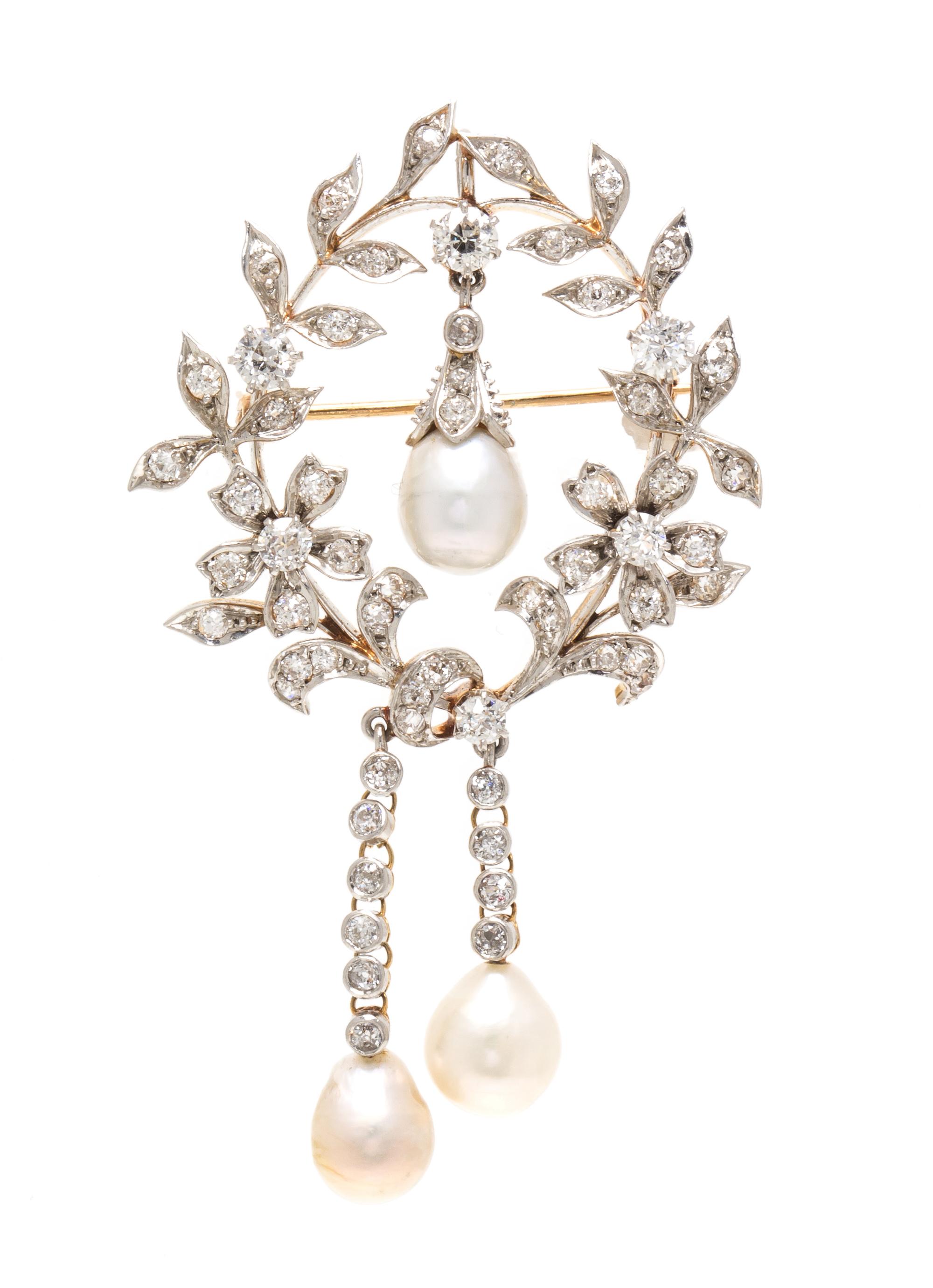 An Edwardian Platinum Topped Yellow Gold, Natural Baroque Pearl and Diamond Pendant/Brooch, 10.90 dwts.