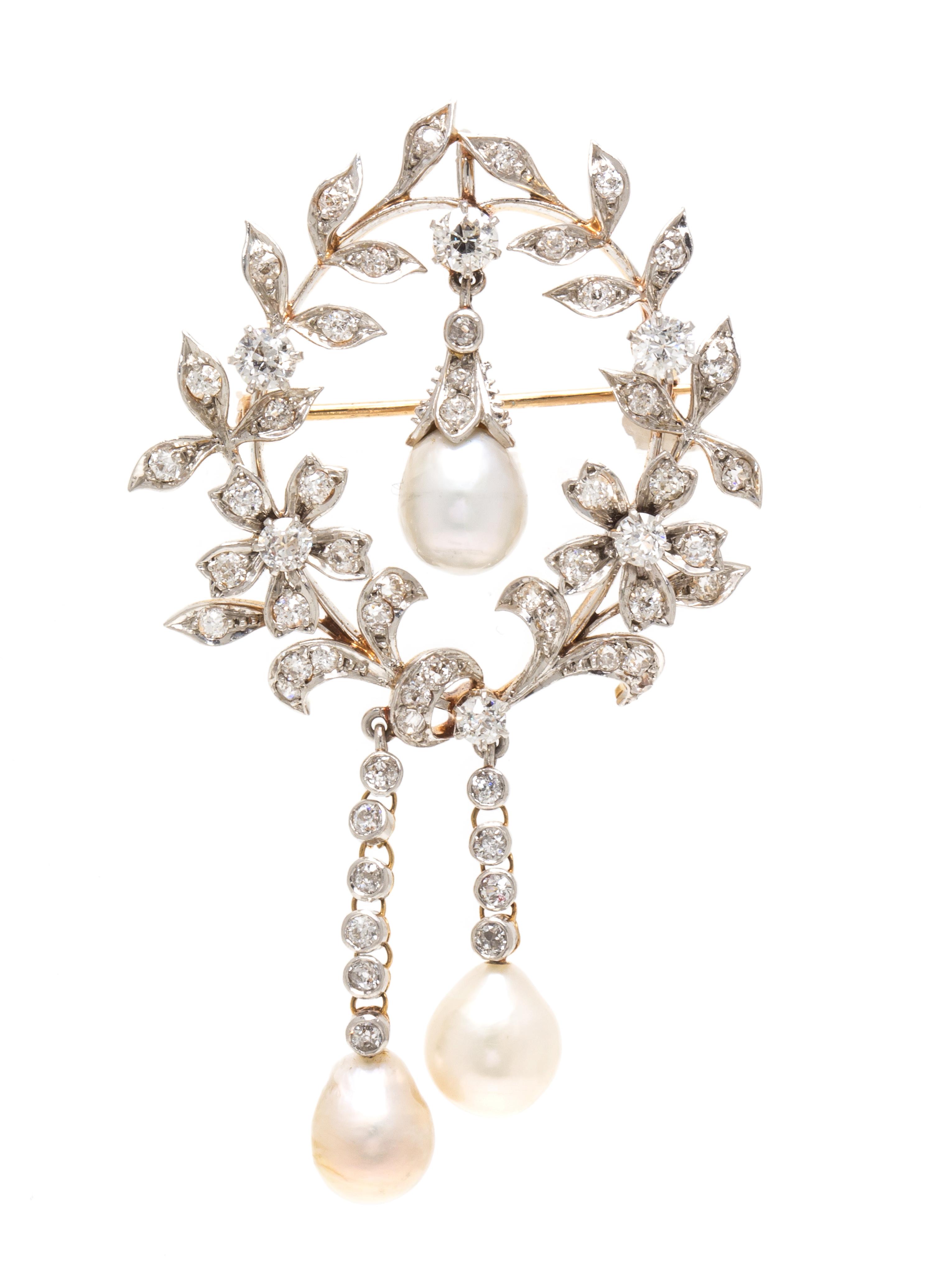 An Edwardian Platinum Topped Yellow Gold, Natural Baroque Pearl and Diamond Pendant/Brooch, 10.90 dwts.