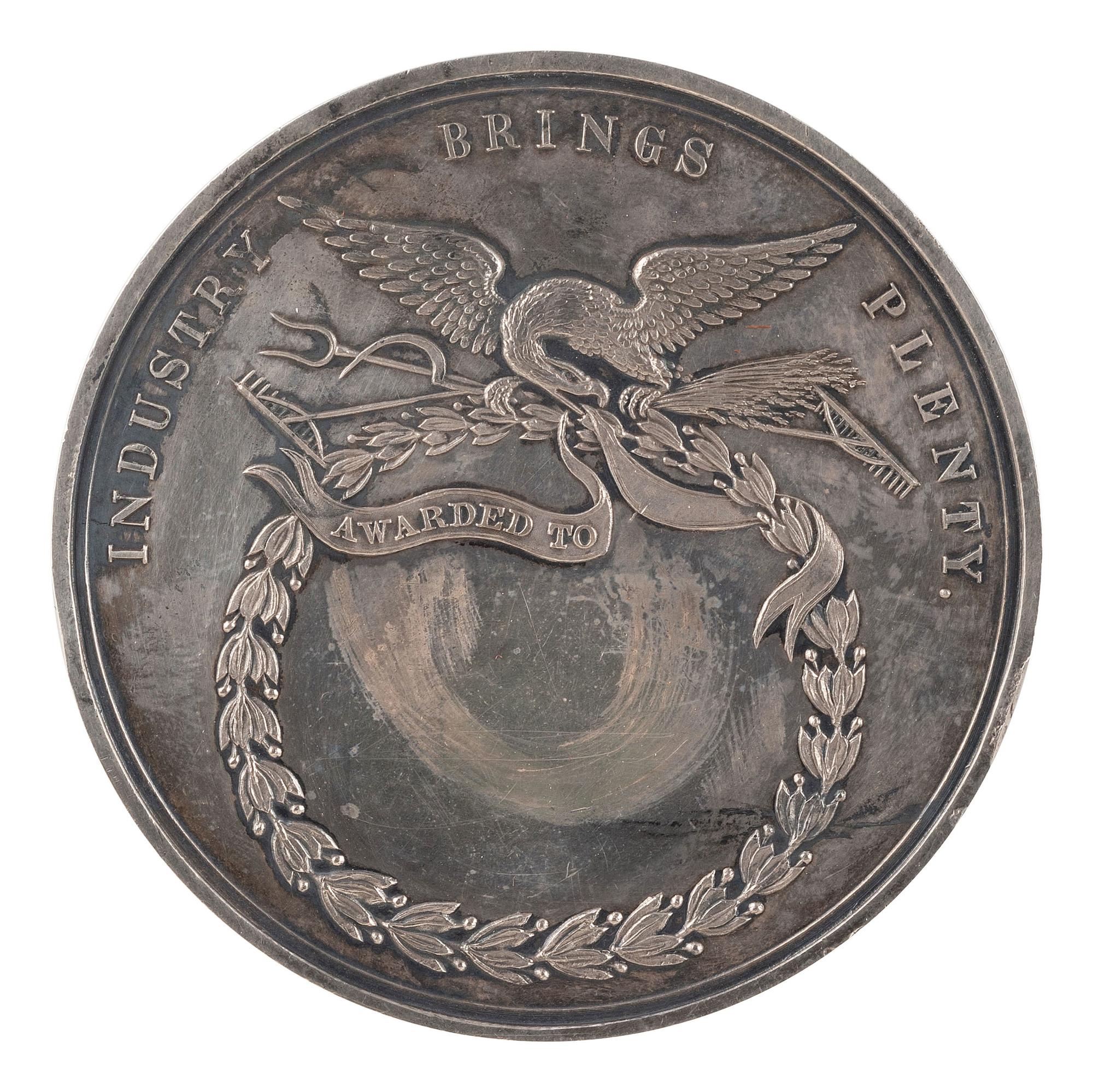 [AGRICULTURE]. St. Louis Agricultural and Mechanical Association silver presentation medal. Ca 1870s.