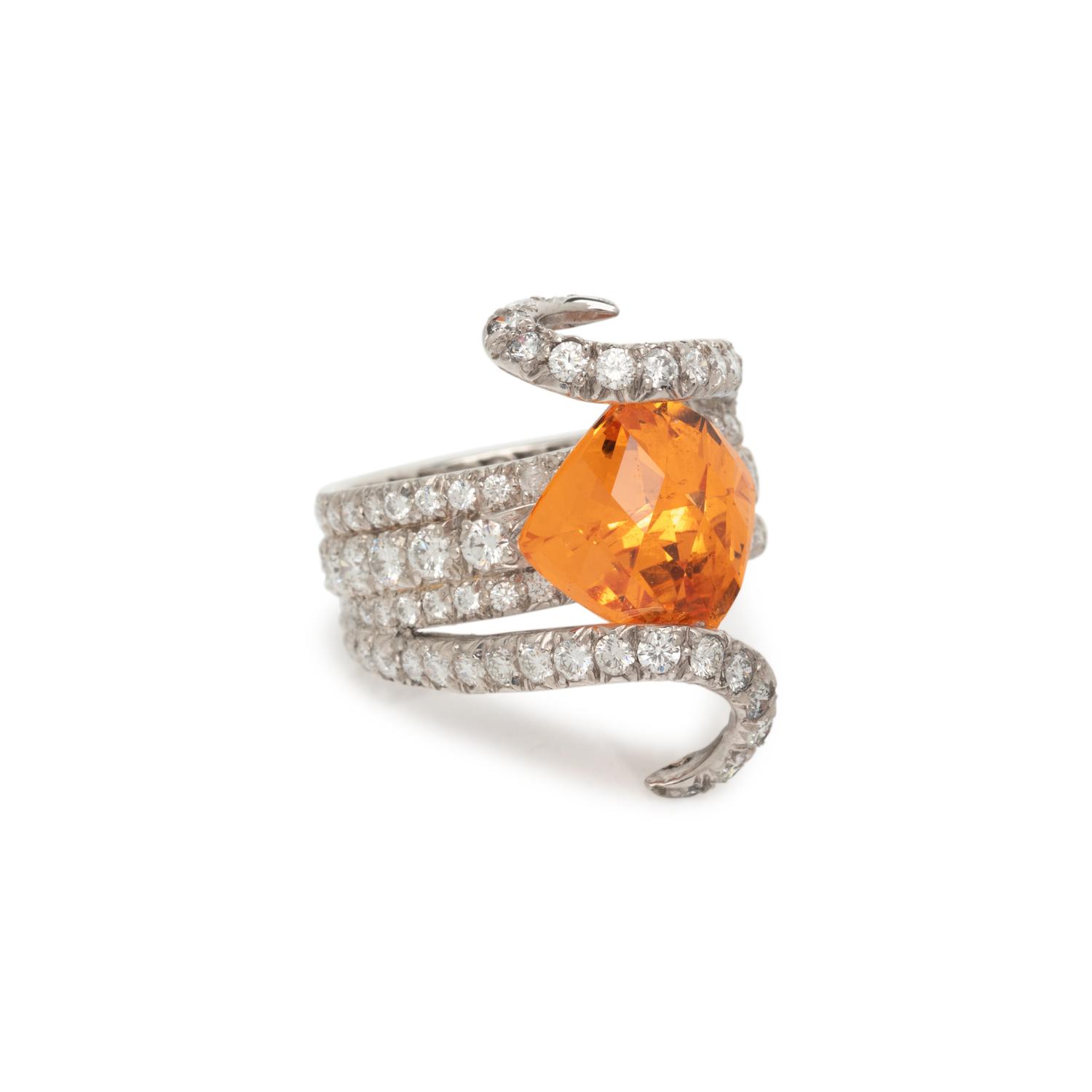 ORANGE GARNET, DIAMOND, AND PLATINUM RING
