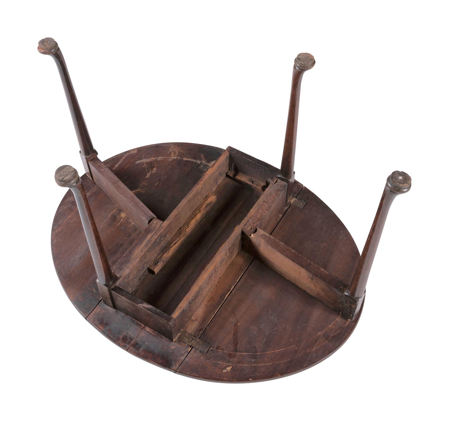 A George III Carved Mahogany Drop-Leaf Table