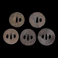 Group of fifteen assorted Japanese tsuba Meiji period and earlier