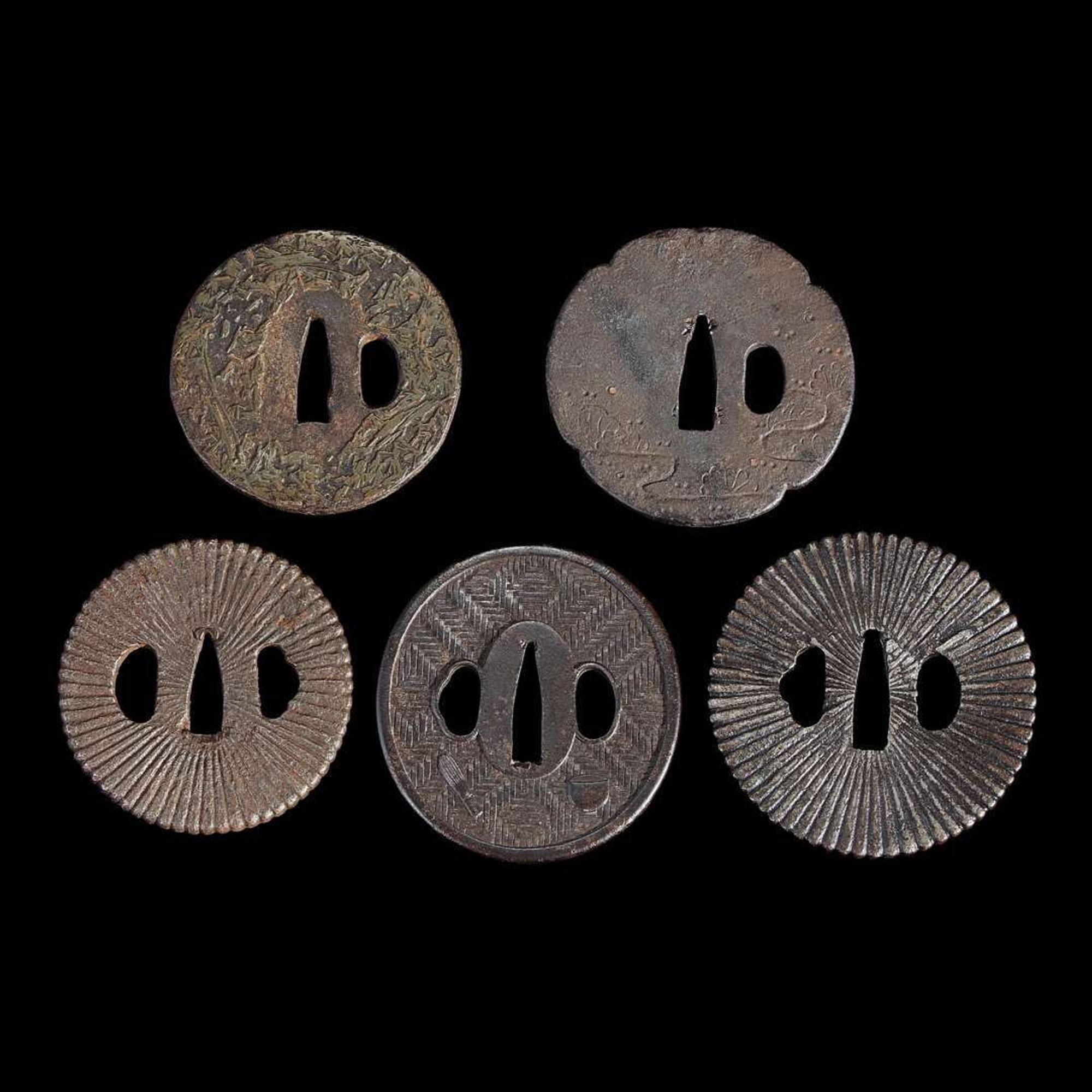 Group of fifteen assorted Japanese tsuba Meiji period and earlier