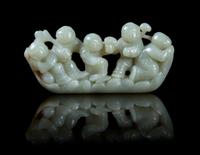 A Carved Jade Figural Group Length 4 inches.