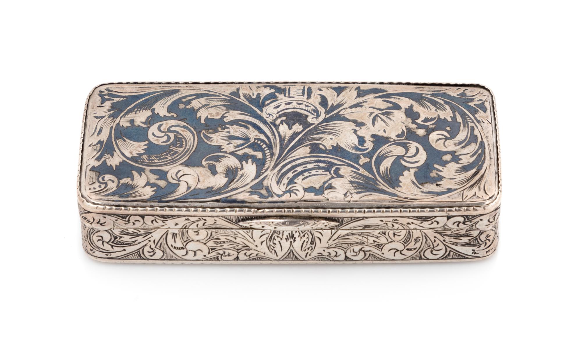 A Russian Silver and Niello Snuff Box, Maker's Mark Obscured, Moscow, 1857, the case worked to show foliate scrolls.