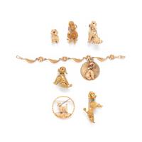 COLLECTION OF YELLOW GOLD POODLE JEWELRY
