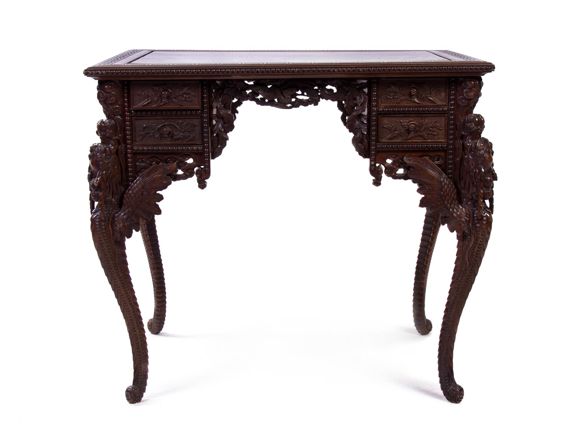 A Chinese Export Mahogany Writing Table, Height 30 x width 34 1/2 x depth 28 inches.
