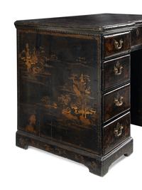A Chinese Export Black and Gilt Lacquered Kneehole Desk