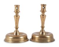 A Pair of Spanish Brass Low Bell Candlesticks