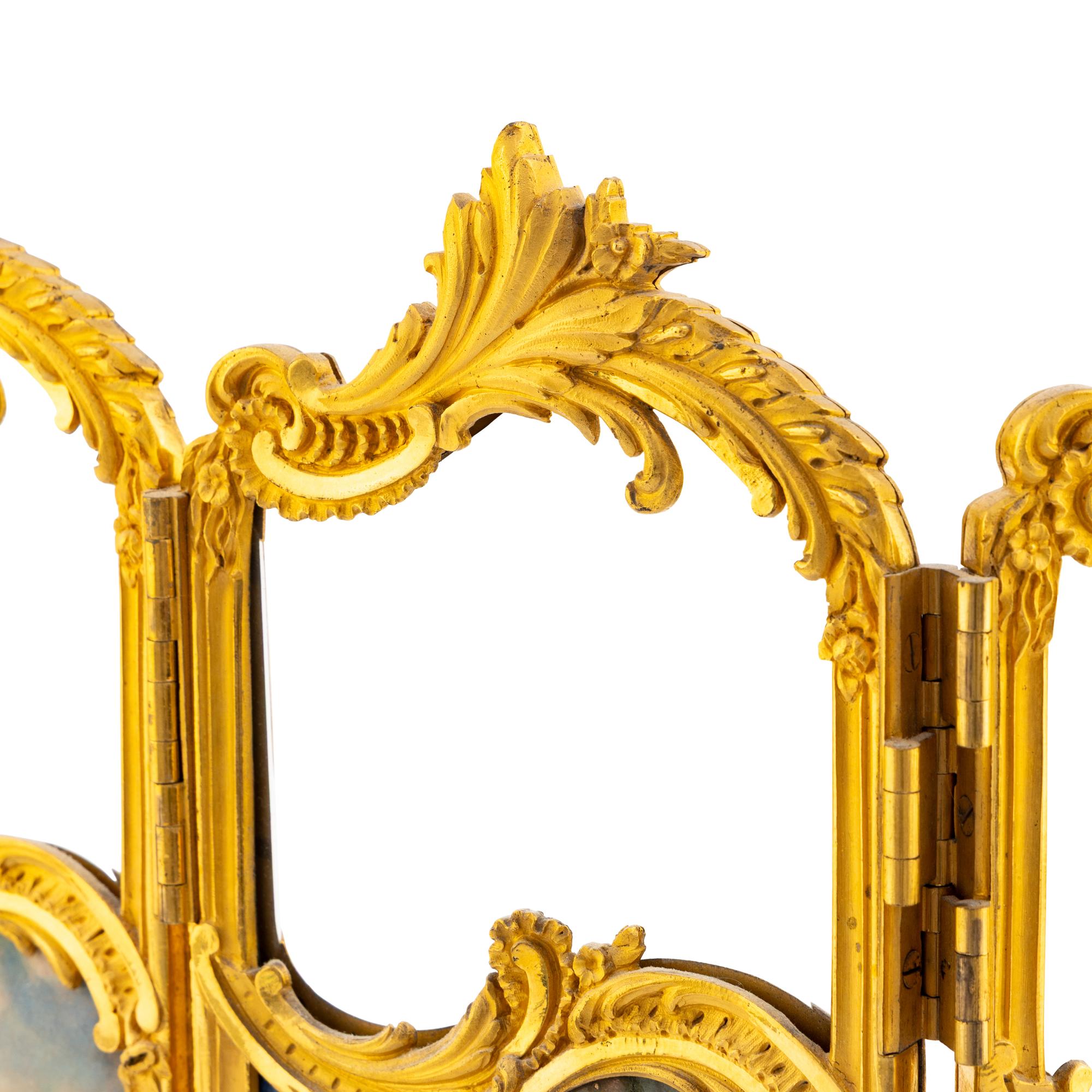 A French Gilt Bronze, Enameled Copper and Glass Table Screen