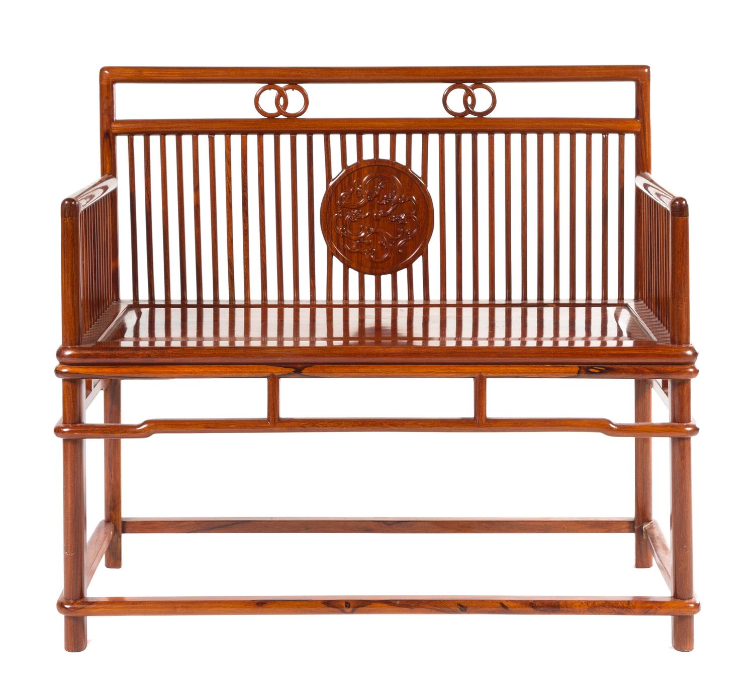 A Chinese Rosewood Bench Height 35 3/4 x width 38 3/8 x depth 18 inches.