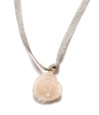A Chanel Pink Lucite Flower Pendant, Length: 27.5"; Pendant: 1.25" x 1.25".