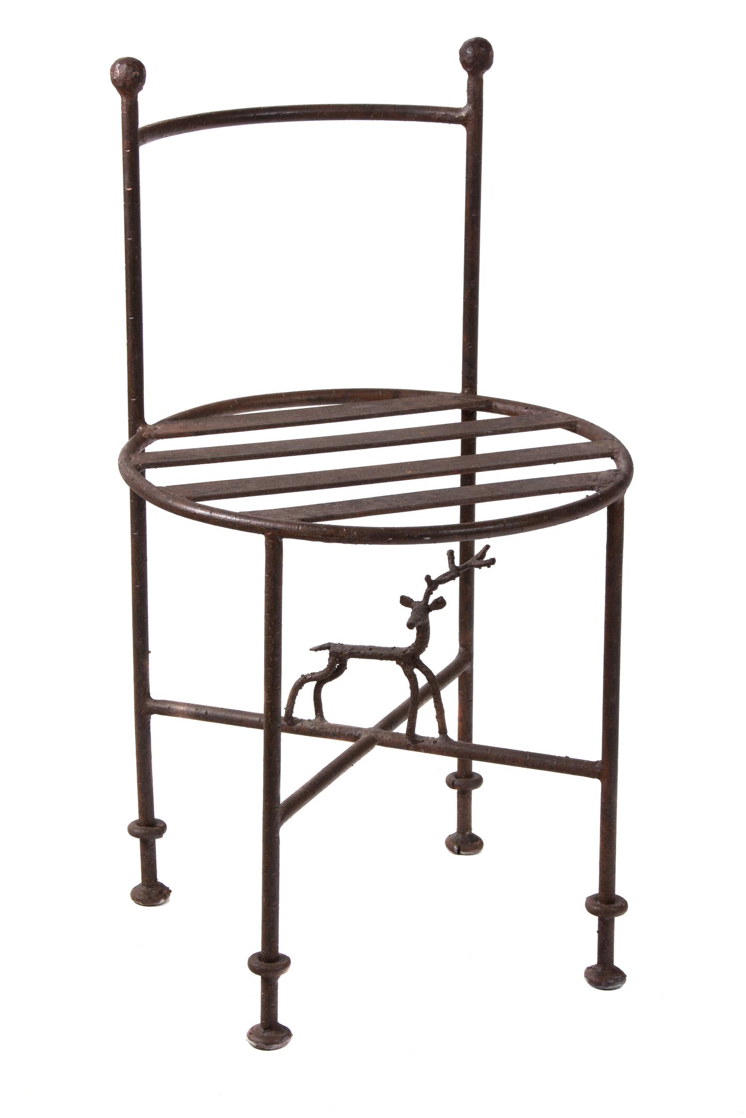 A Giacometti Style Metal Chair Height 27 inches. — 20TH CENTURY