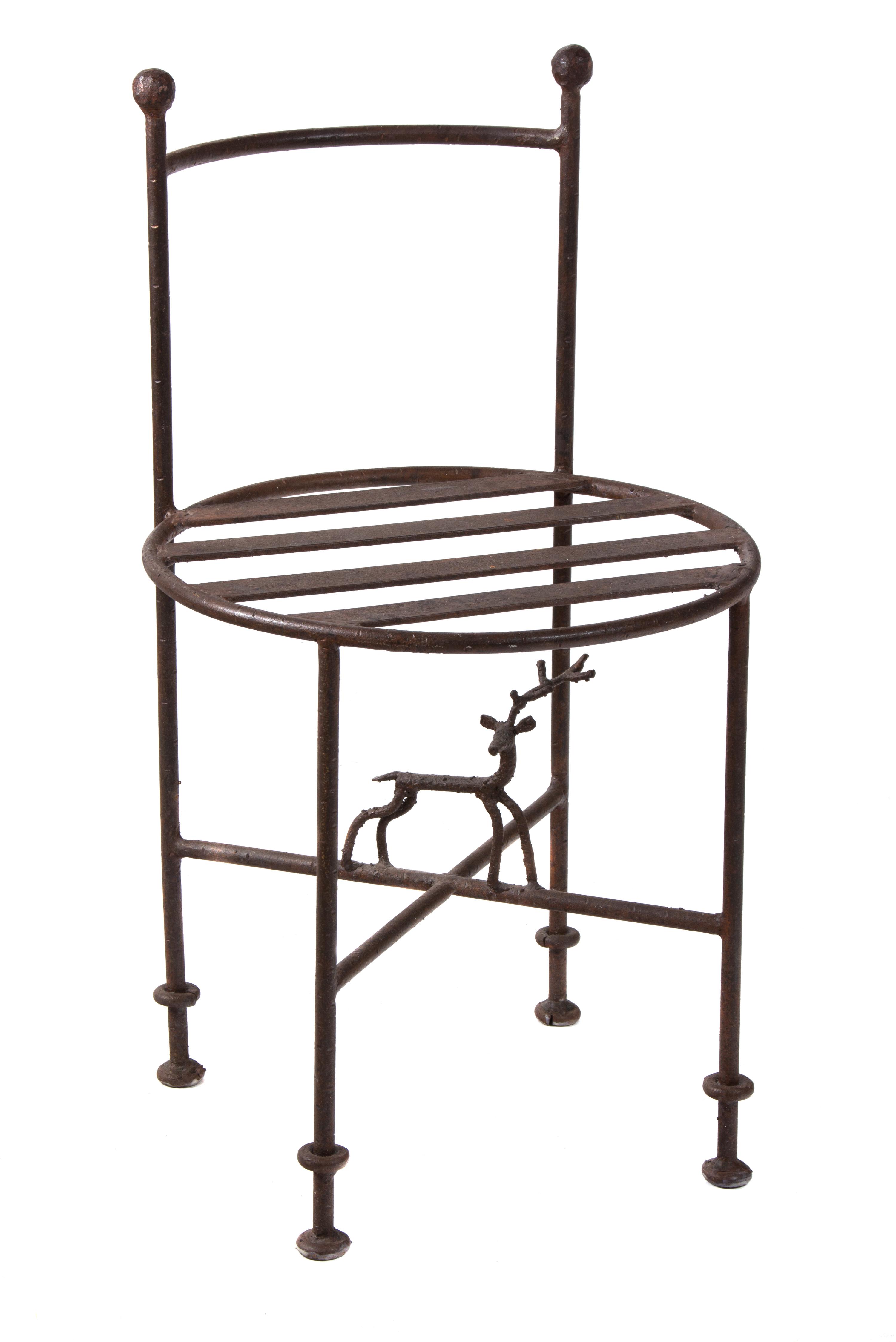 A Giacometti Style Metal Chair Height 27 inches. — 20TH CENTURY